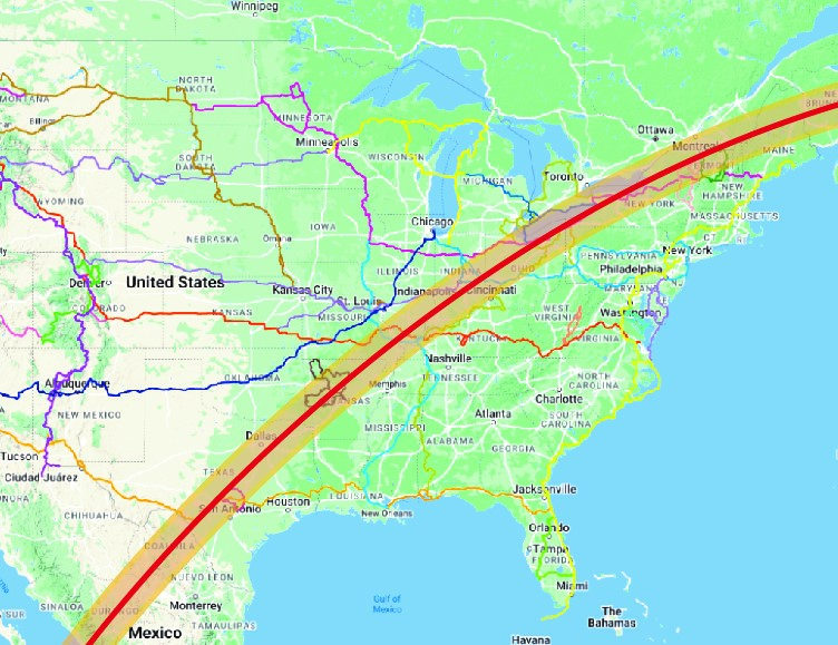 the path of the eclipse on top of a map of Adventure Cycling routes