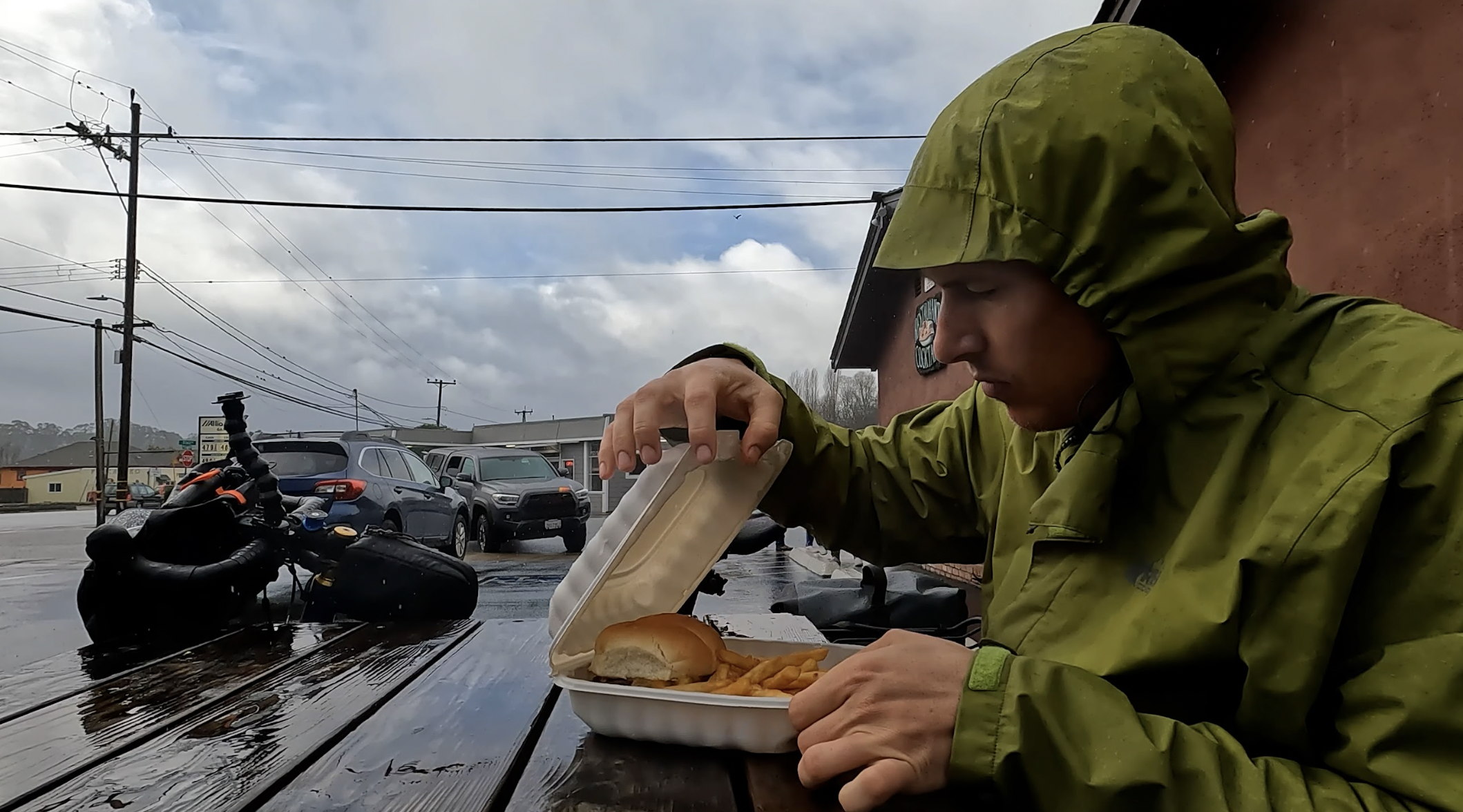 a bike packer eats some food